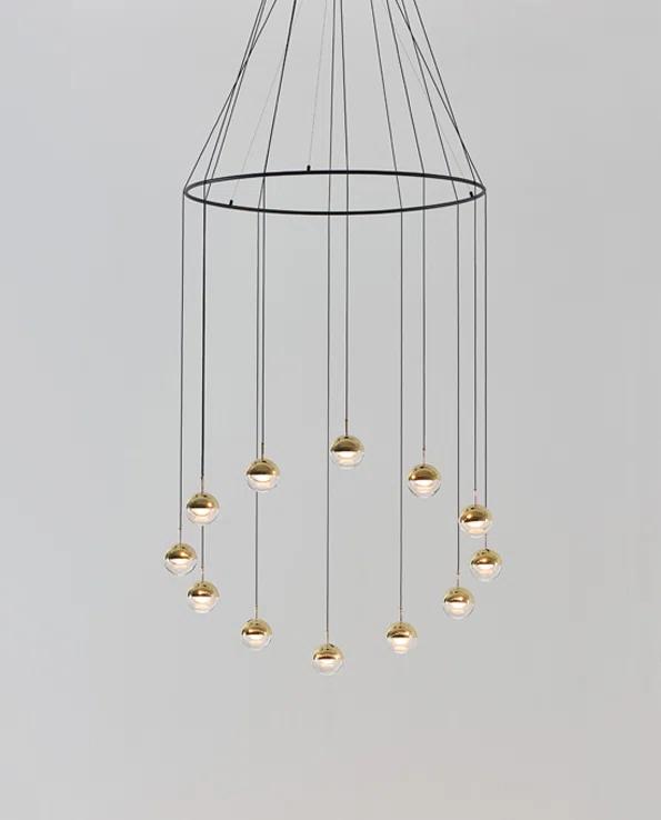 Dora Brass Globe 12-Light LED Pendant with Warm Orb Effect