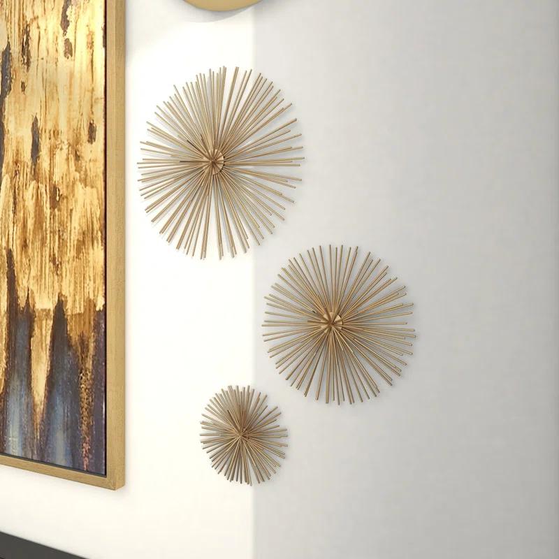 CosmoLiving by Cosmopolitan Gold Metal Starburst 3D Short Spike Home Wall Decor, Set of 3 6", 9", 12"W