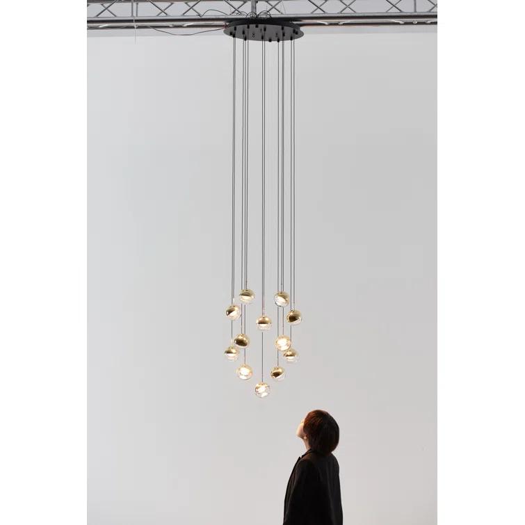 Dora Brass Globe 12-Light LED Pendant with Warm Orb Effect