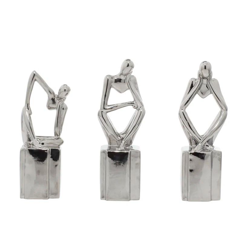 CosmoLiving by Cosmopolitan Porcelain Ceramic Sitting Thinker People Decorative Sculpture Set