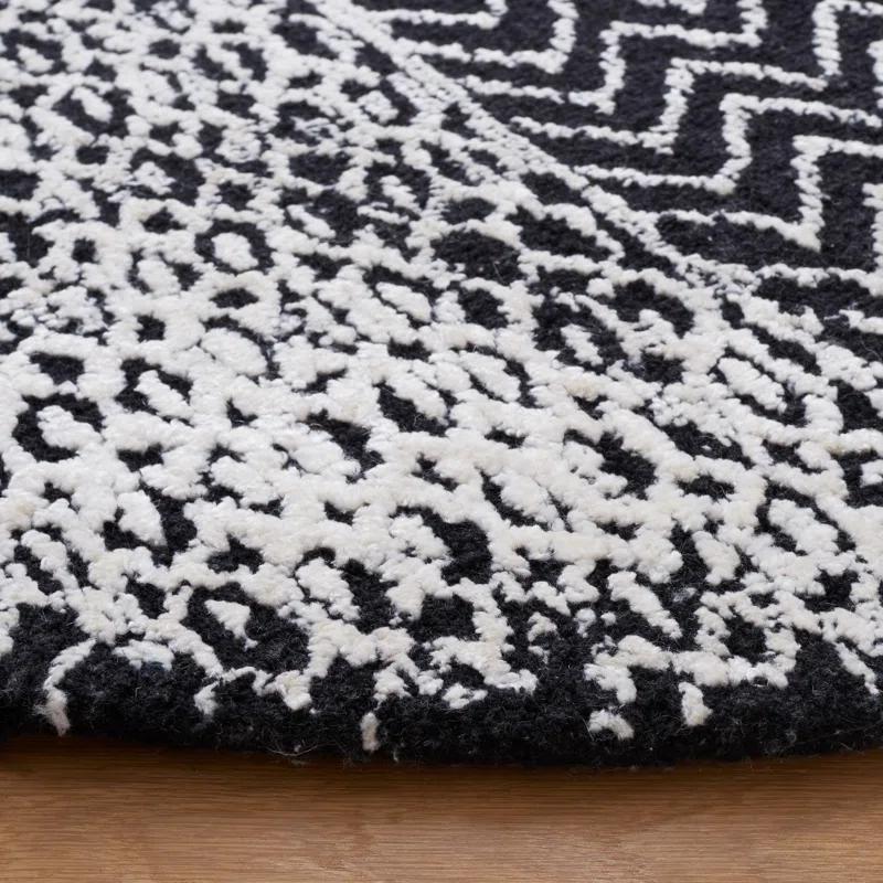 Foundry Select Glamour Hand Tufted Viscose/Wool Southwestern Rug in Ivory/Black