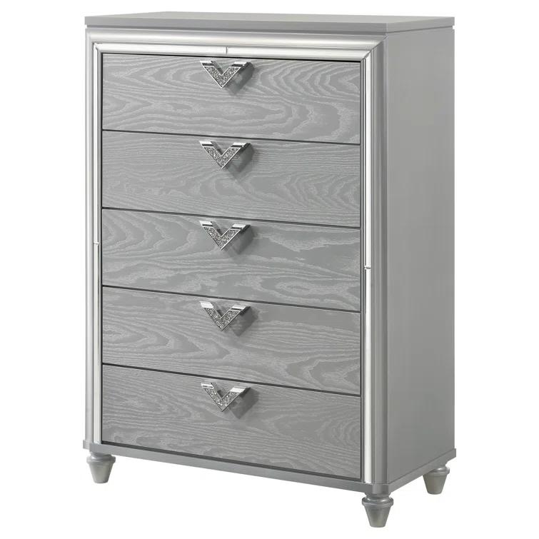 Benjara Haley Tall Dresser Chest, V Shaped Glittering Metal Handles, Light Silver