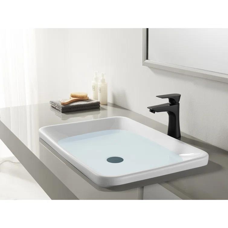 Kingston Brass Millennium Single Hole Bathroom Faucet with Drain Assembly LS4220XL