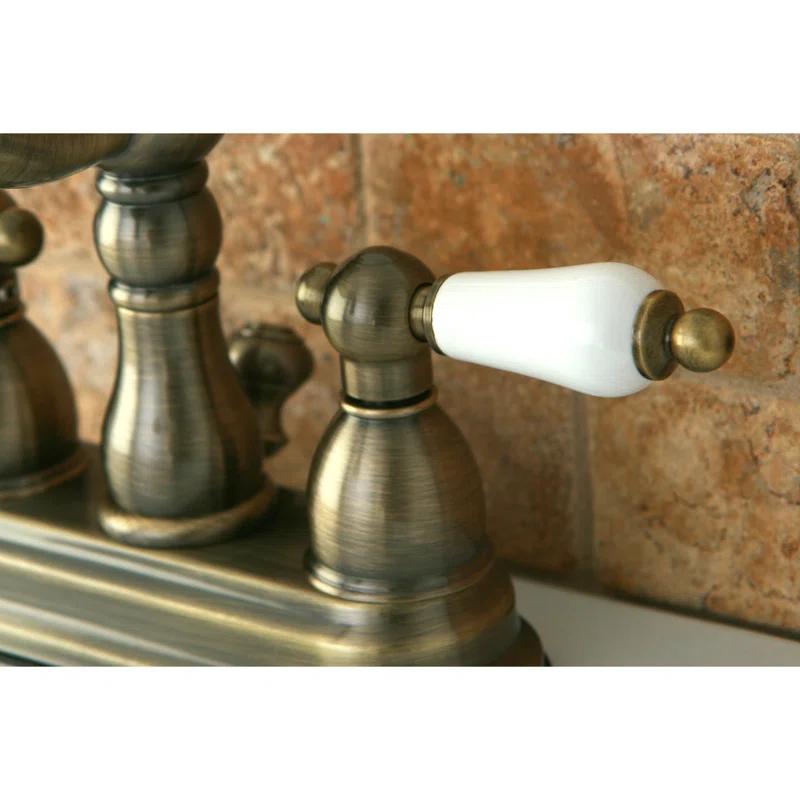 Kingston Brass Heritage Two-Handle 3-Hole Deck Mount 4" Centerset Bathroom Faucet with Plastic Pop-Up