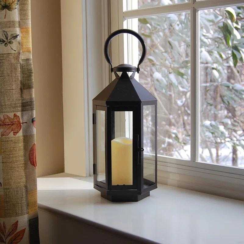 The Holiday Aisle® Black Hexagon Metal Lantern with Battery-Operated Candle