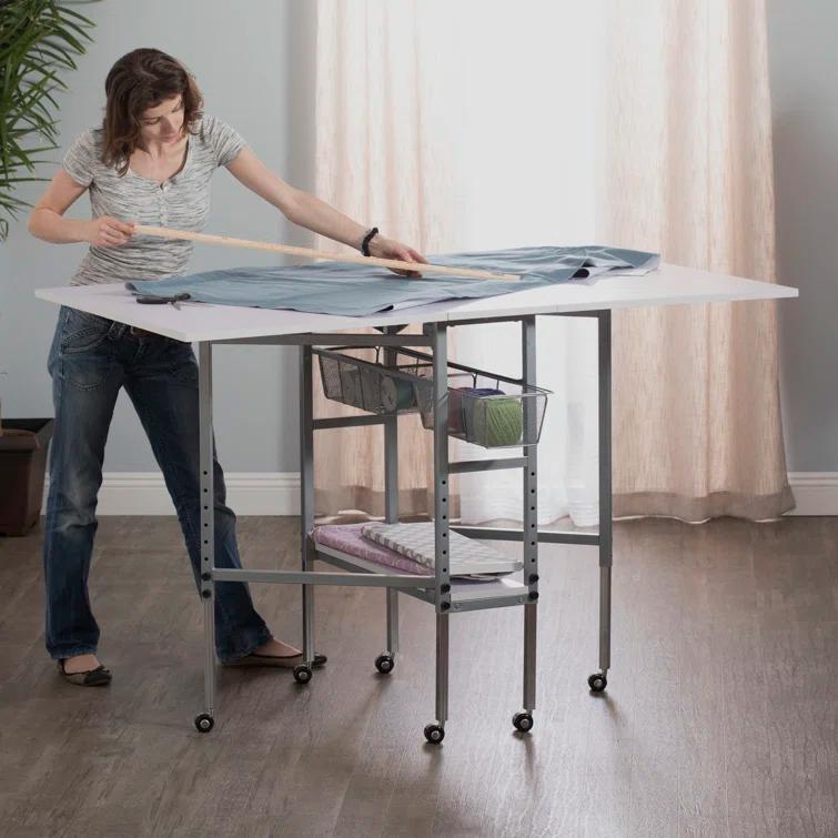 Sew Ready 58.75'' x 36.5'' Foldable Sewing Table with Sewing Machine Platform and Wheels