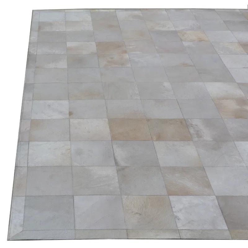 Exquisite Rugs Natural Hide Hand Stitched Leather Hide on Felt White Area Rug & Reviews | Wayfair