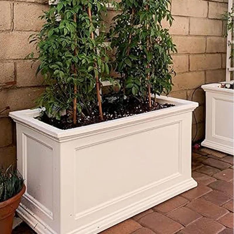Winston Porter Anastasiya 20"x36" Resin Planter with Water Reservoir