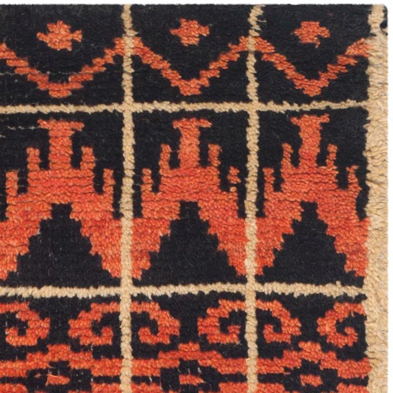 Union Rustic Alimatou Hand Knotted Wool/Cotton Southwestern Rug in Orange/Black