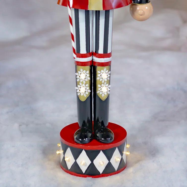 The Holiday Aisle® Large Iron Christmas Nutcracker "Harry" with Candy Cane