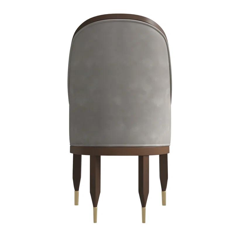 Everly Quinn Jacinto Dining Chair Upholstered In Leather With Rubberwood Frame And Legs With Gold Caps