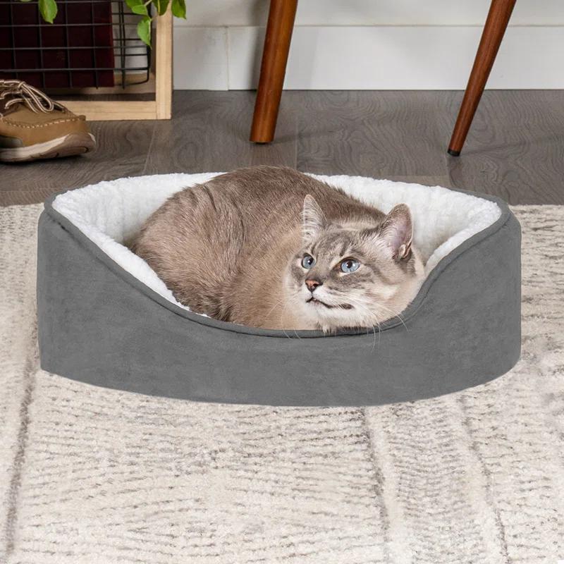 FurHaven Faux Sherpa & Suede Oval Dog Bed