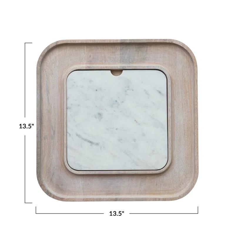 Creative Co-Op Marble And Wood Cutting Board On A Dish