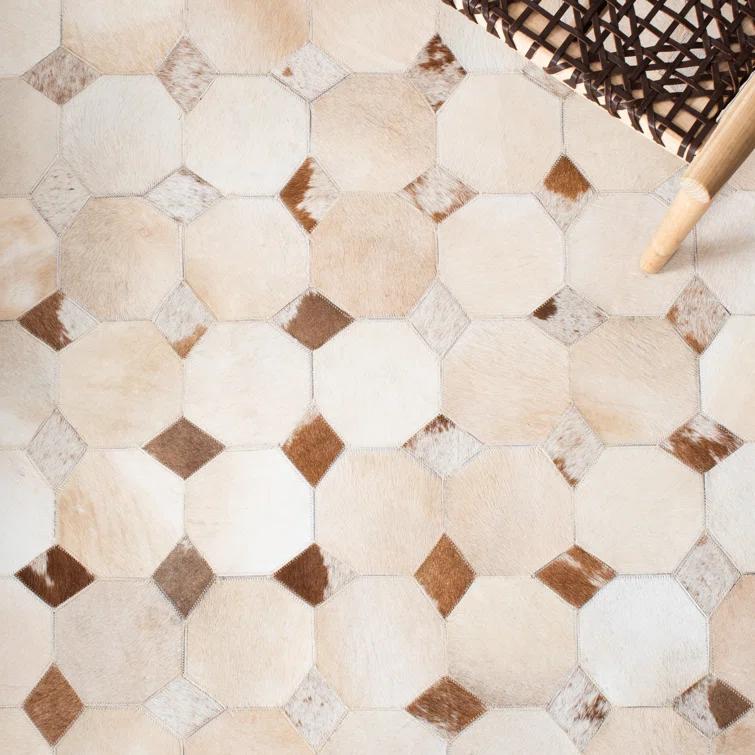 Loon Peak® Bersa Flat Weave Hair On Leather Geometric Rug