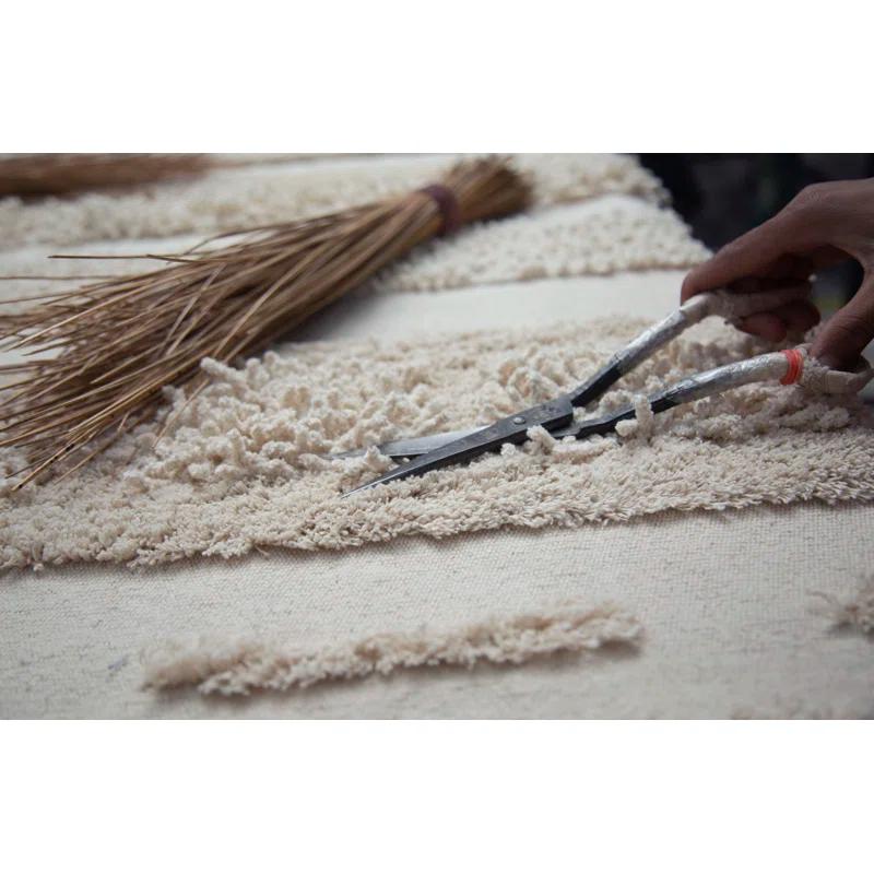 Lorena Canals Solid Color Handmade Tufted Rectangle 5'7" x 8' Cotton Area Rug in Natural