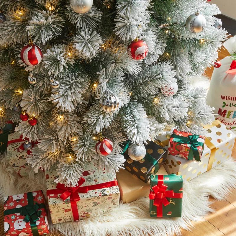 The Twillery Co.® Slender Flocked Pine Christmas Tree with LED Lights