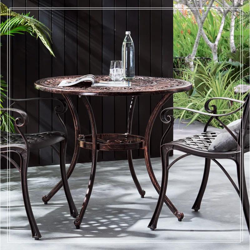 Fleur De Lis Living Outdoor Round Cast Aluminum Dining Table, Shiny Copper | Wayfair