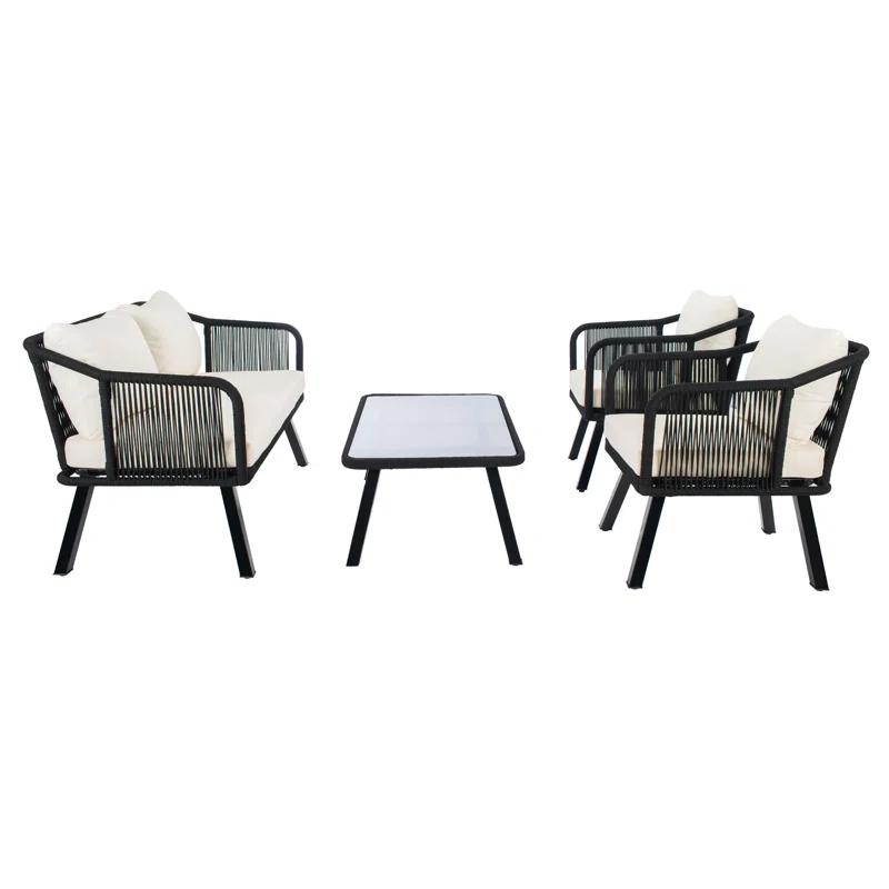 Highland Dunes Orme 4 Piece Rattan Sofa Seating Group with Cushions & Reviews | Wayfair