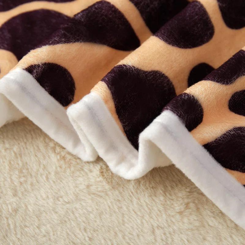 Kindred Home Lightweight Flannel Fleece Leopard Print Throw Blanket for Couch, Bed, Holiday Decor (60x80 Inches)