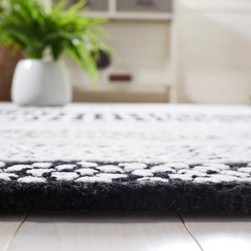 Foundry Select Glamour Hand Tufted Viscose/Wool Southwestern Rug in Ivory/Black