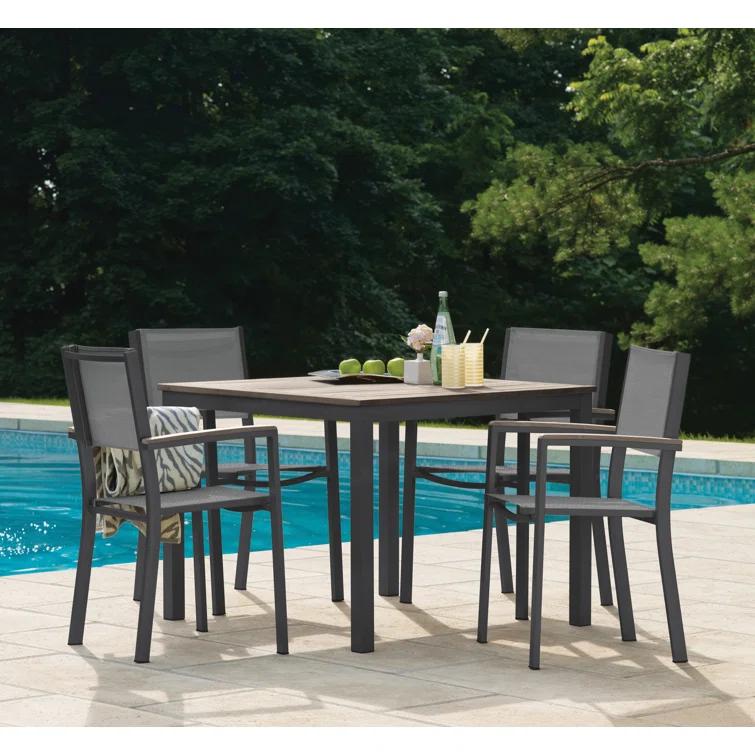 Oxford Garden Travira Stacking Patio Arm Chair (Set of 4)