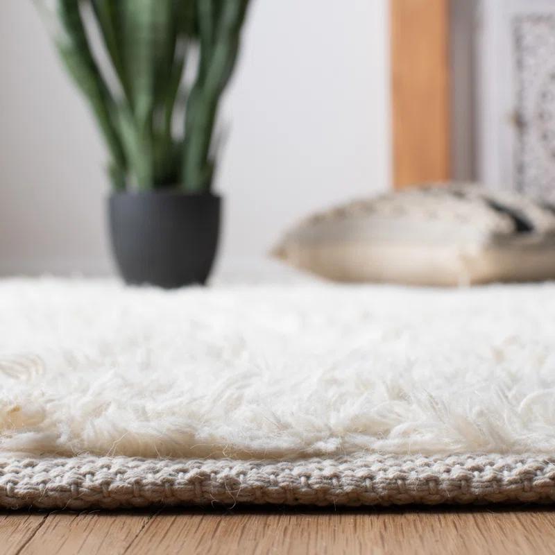 Henrie Geometric Handwoven Area Rug in Ivory/Gray