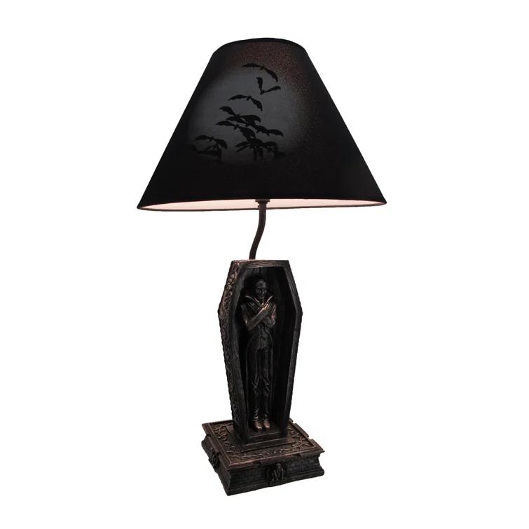 The Holiday Aisle® Nihan Resin Table Lamp