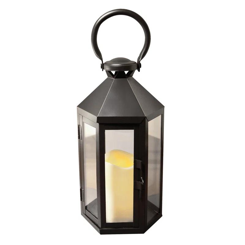 The Holiday Aisle® Black Hexagon Metal Lantern with Battery-Operated Candle