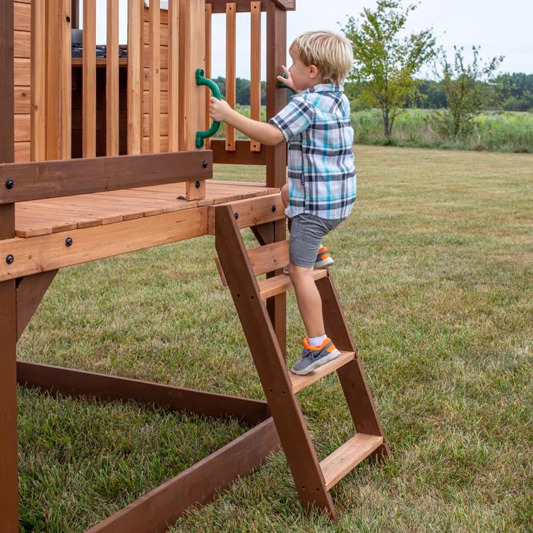 Backyard Discovery Echo Heights Cedar Wooden Elevated Kids Playhouse with Wave Slide, Play Kitchen, and Deck & Reviews | Wayfair