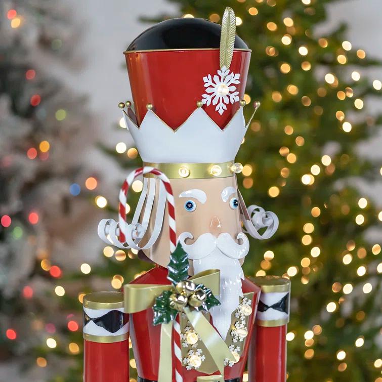 The Holiday Aisle® Large Iron Christmas Nutcracker "Harry" with Candy Cane