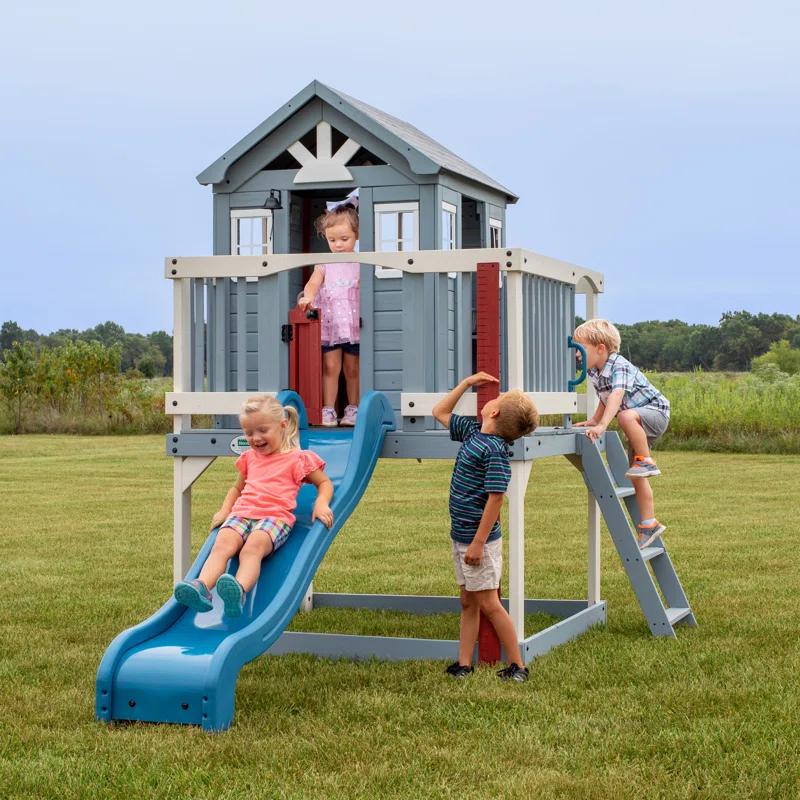 Backyard Discovery Backyard Discovery Beacon Heights Cedar Wooden Elevated Kids Playhouse with Wave Slide, Play Kitchen, and Deck