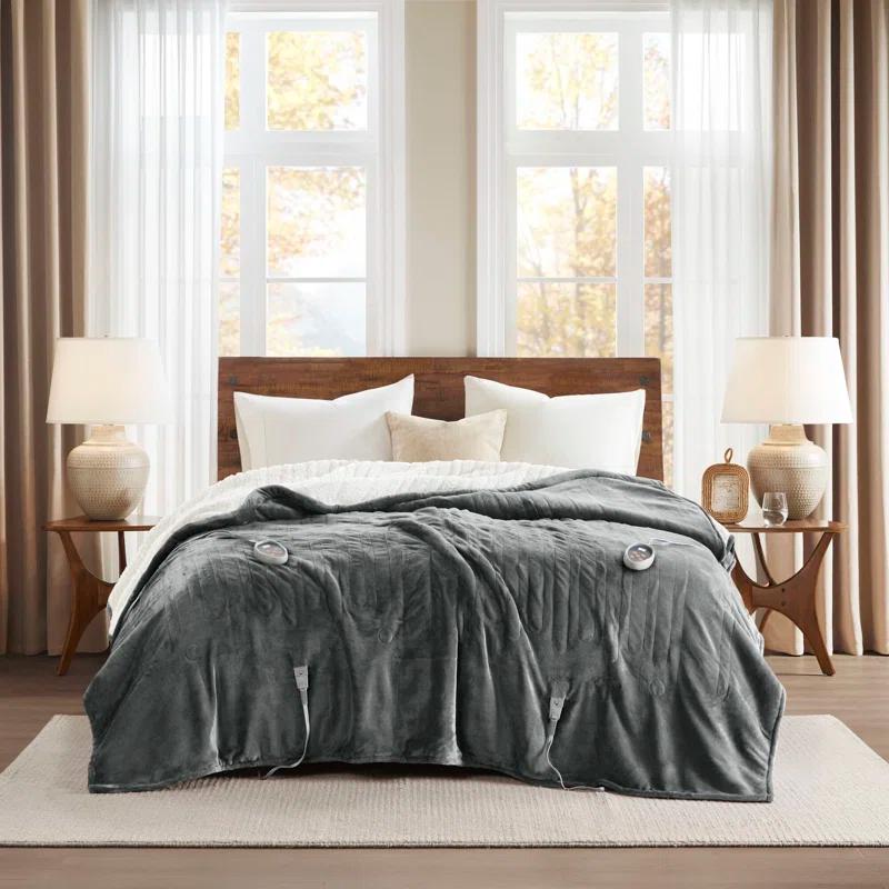 Woolrich Heated Plush to Berber Blanket