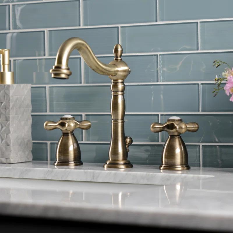 Kingston Brass Heritage Two-Handle 3-Hole Deck Mount Widespread Bathroom Faucet with Pop-Up Drain