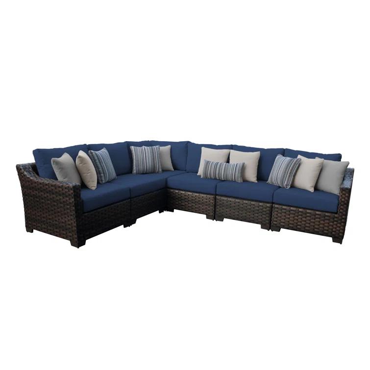 kathy ireland Homes & Gardens by TK Classics 126'' Wide Wicker Patio Sectional with Cushions