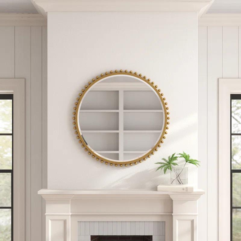 Bedonia 32" Round Metal Wall Mirror