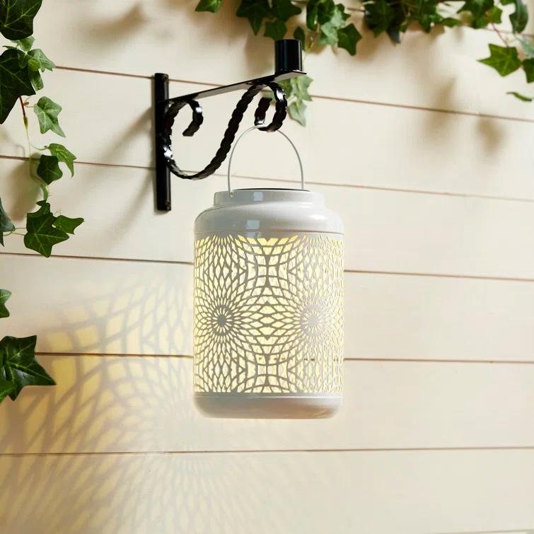 Winston Porter 8.75"H Metal Cutout Solar Powered Outdoor Hanging Lantern