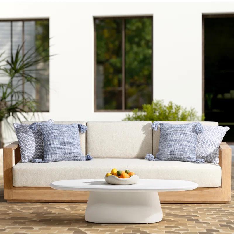 Avry 55'' White Stone Oval Outdoor Coffee Table