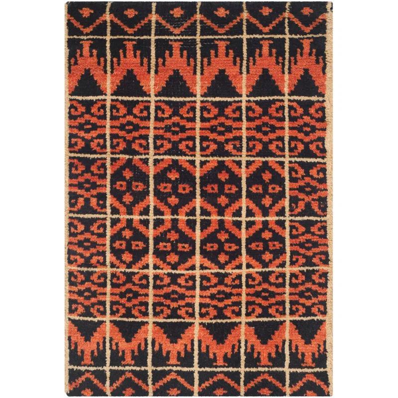 Union Rustic Alimatou Hand Knotted Wool/Cotton Southwestern Rug in Orange/Black