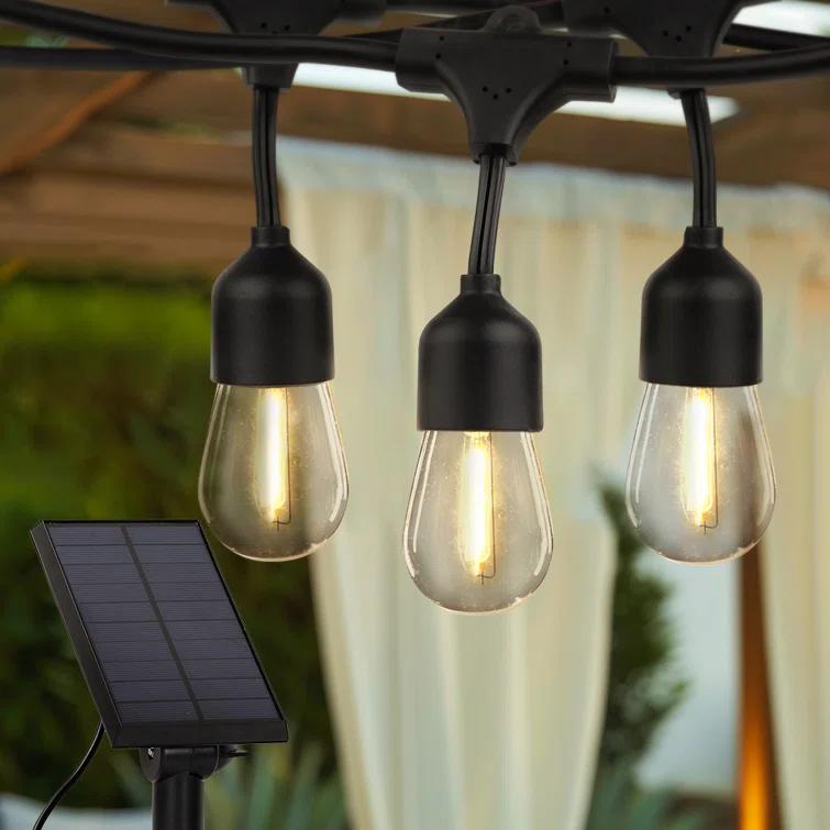 Brightech Ambience Pro 48 ft. Solar-Powered Outdoor LED String Lights with 15 Warm White S14 Bulbs, Weatherproof and Commercial-Grade Cord