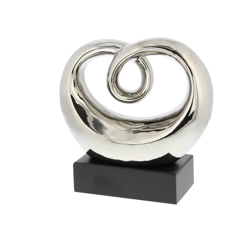 Wrought Studio™ Allye Ceramic Swirl Abstract Decorative Silver Sculpture with Black Base