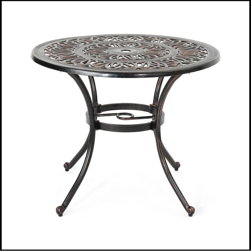 Fleur De Lis Living Outdoor Round Cast Aluminum Dining Table, Shiny Copper | Wayfair