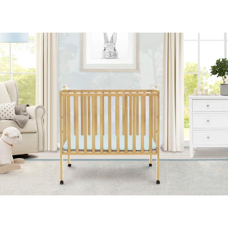 Delta Children Folding Mini Portable Crib with Mattress