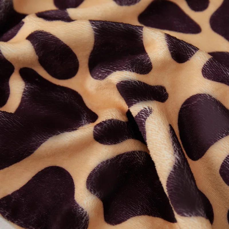 Kindred Home Lightweight Flannel Fleece Leopard Print Throw Blanket for Couch, Bed, Holiday Decor (60x80 Inches)