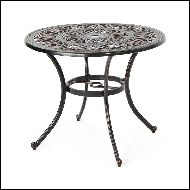 Fleur De Lis Living Outdoor Round Cast Aluminum Dining Table, Shiny Copper | Wayfair