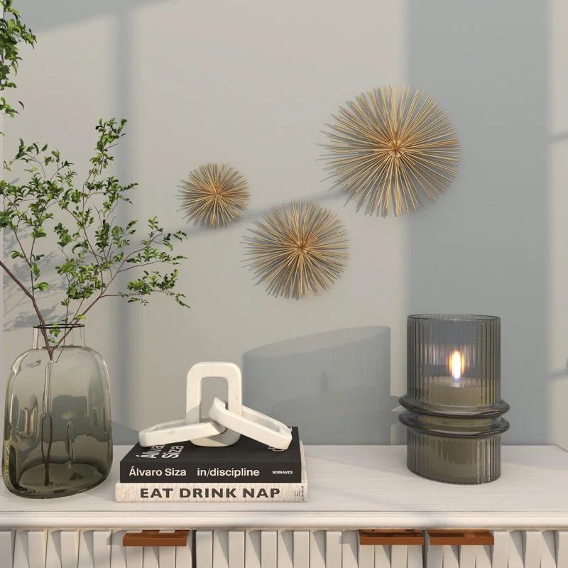 CosmoLiving by Cosmopolitan Gold Metal Starburst 3D Short Spike Home Wall Decor, Set of 3 6", 9", 12"W