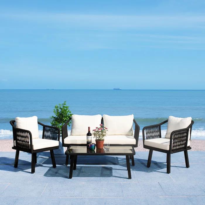 Highland Dunes Orme 4 Piece Rattan Sofa Seating Group with Cushions & Reviews | Wayfair