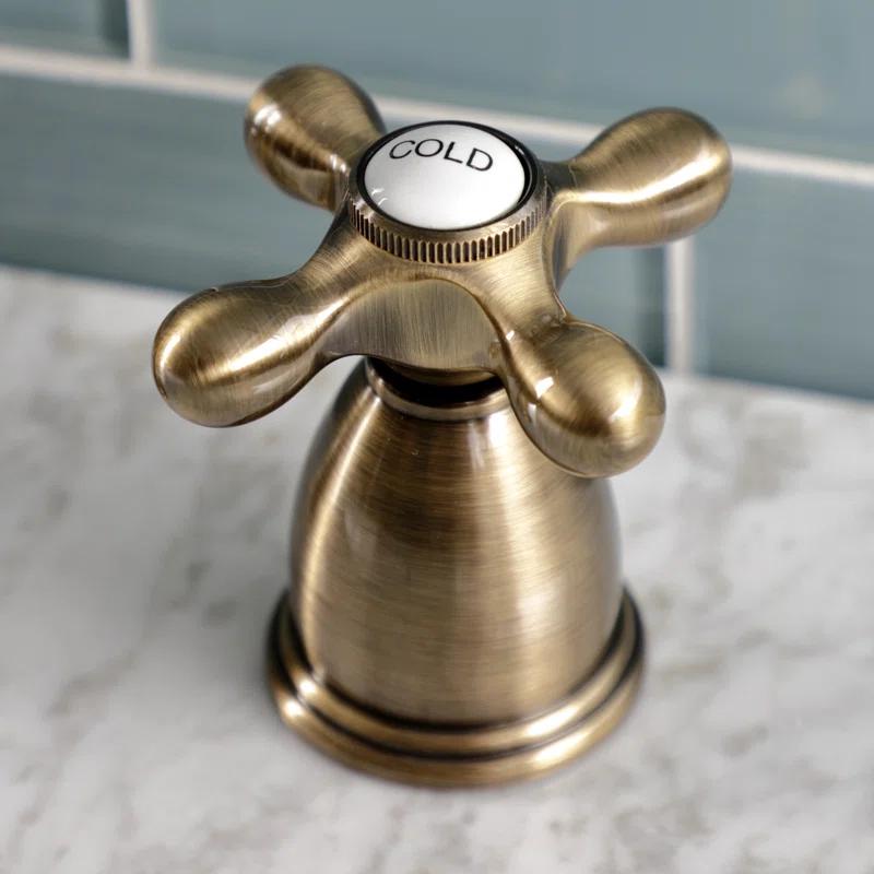 Kingston Brass Heritage Two-Handle 3-Hole Deck Mount Widespread Bathroom Faucet with Pop-Up Drain