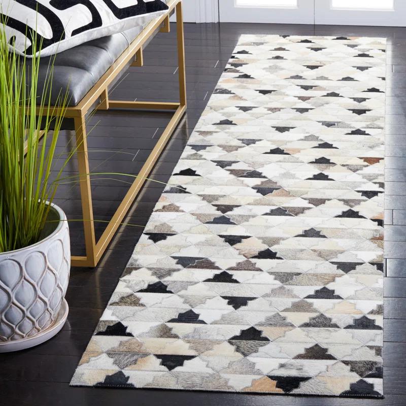Loon Peak® Brentnal Flat Weave Hair On Leather Geometric Rug