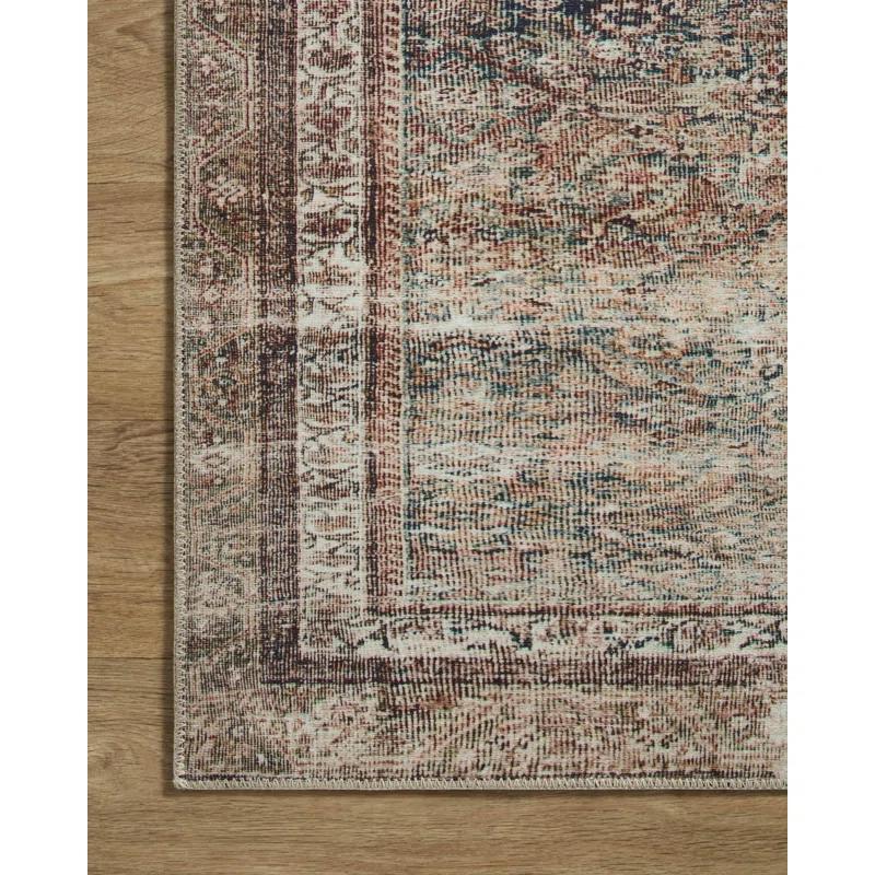 Jules Oriental Power Loomed Polyester Area Rug in Ink / Terracotta