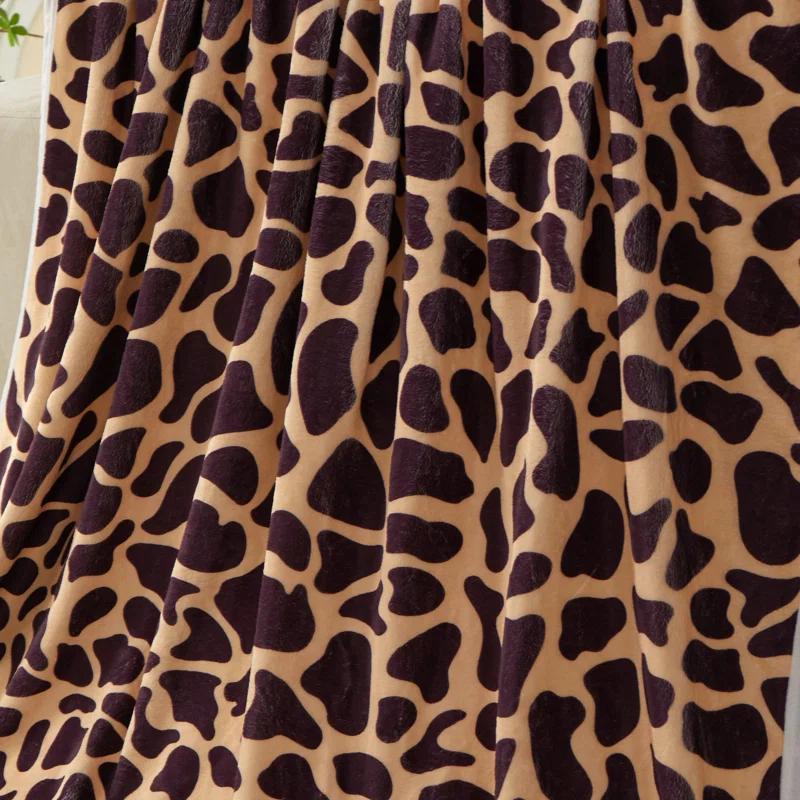 Kindred Home Lightweight Flannel Fleece Leopard Print Throw Blanket for Couch, Bed, Holiday Decor (60x80 Inches)